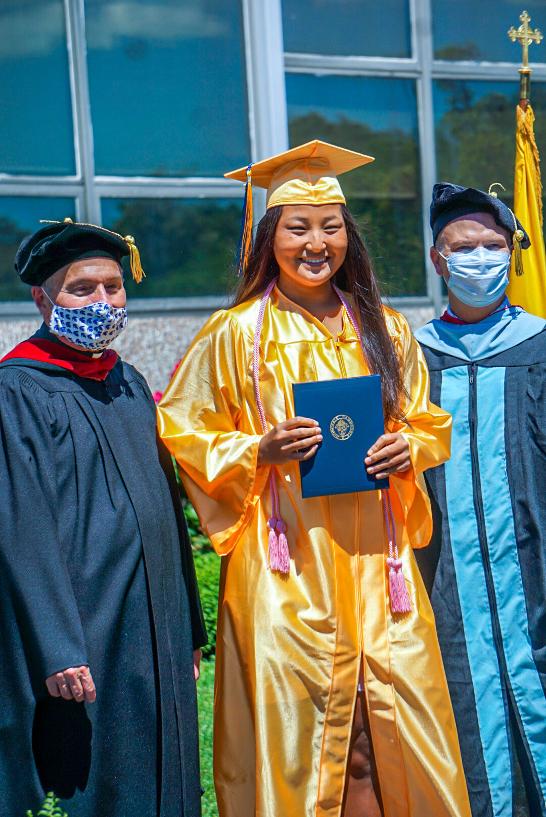 Holy Spirit drive-through diploma pickup